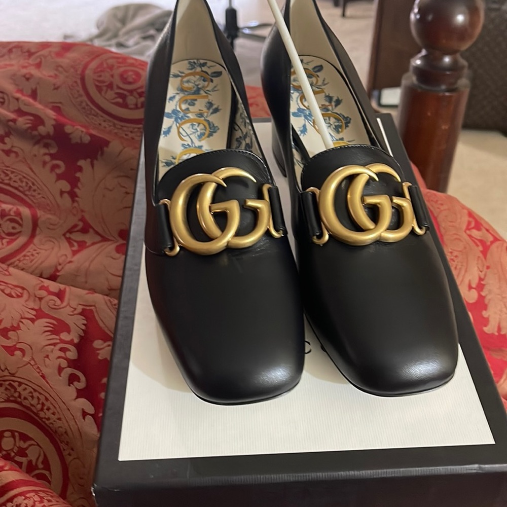 100 percent authentic, new with tags, box and dust bag.